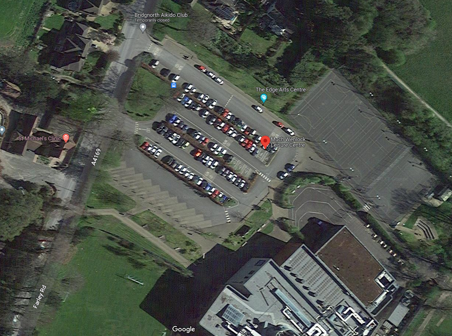 Aerial view of a parking lot

Description automatically generated with medium confidence